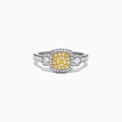The Canare 18K Two-Tone Gold Cushion Double Halo Yellow Diamond Ring, 0.96 TCW, features a cushion-cut yellow diamond with a double white diamond halo and diamonds set along the band.