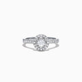 The Pave Classica 14K White Gold Diamond Halo Ring, 0.59 TCW, showcases a brilliant round center stone with a double halo and diamonds along the band, all elegantly set in white gold and displayed on a white background.