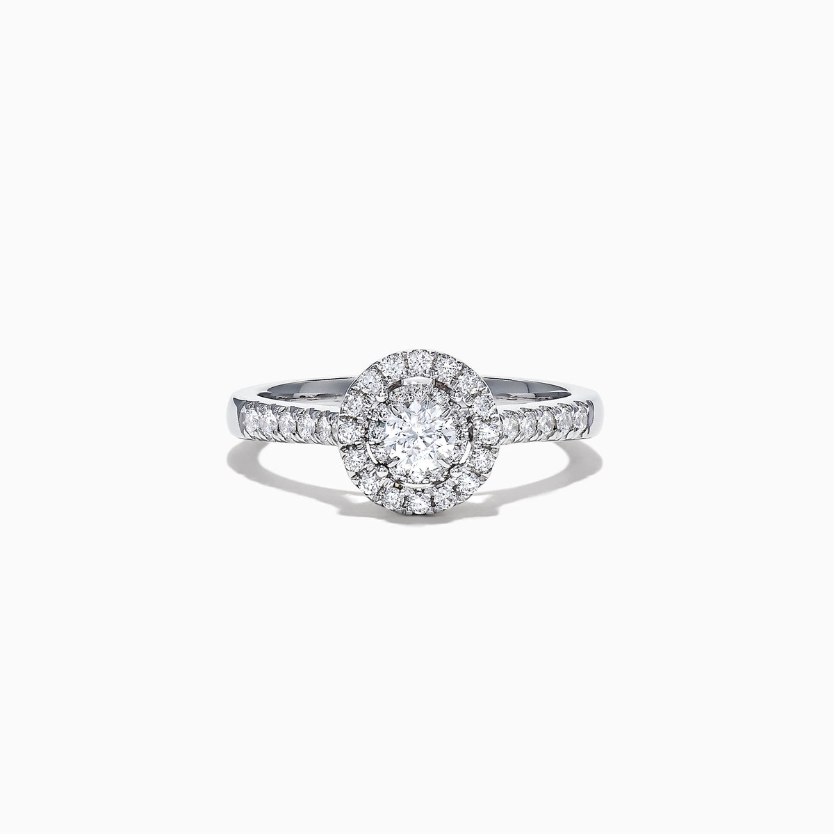 The Pave Classica 14K White Gold Diamond Halo Ring, 0.59 TCW, showcases a brilliant round center stone with a double halo and diamonds along the band, all elegantly set in white gold and displayed on a white background.