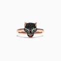 The Signature 14K Rose Gold Black Diamond & Emerald Mini Ring (0.46 TCW) features a panther head design with black diamonds and emerald eyes, shown against a white background.