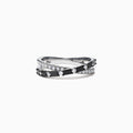 The 14K White Gold Black and White Diamond Crossover Ring, 0.77 TCW, features two intertwined bands with alternating black and white diamonds, displayed on a white background.