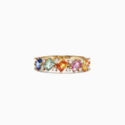 The Watercolors 14K Yellow Gold Multi-Sapphire Diamond Ring, 1.52 TCW, showcases a row of rectangular blue, green, yellow, orange, and pink sapphires with diamond accents, displayed on a white background.