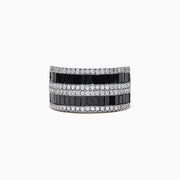 The 14K White Gold Black and White Diamond Ring, 2.48 TCW, features alternating rows of rectangular black and white diamonds in a sleek band, elegantly displayed against a white background.