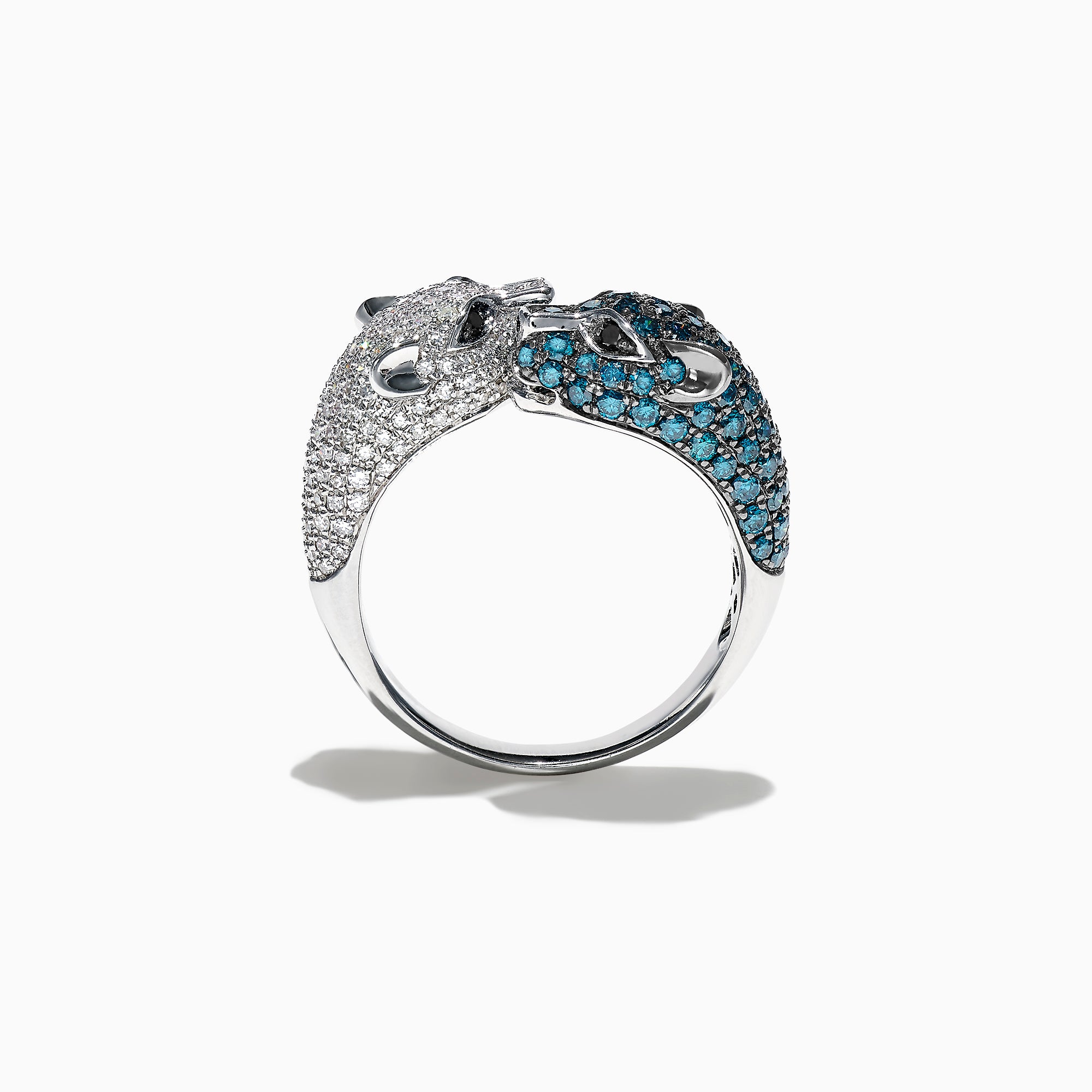 The Signature 14K White Gold Blue and White Diamond Panther Ring, 1.48 TCW, features two panther heads—one adorned with blue and white diamonds—facing each other on a sleek white gold band.