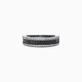 The 14K White Gold Black and White Diamond Band Ring, 1.06 TCW, showcases a row of rectangular black diamonds framed by two rows of round white diamonds on a sleek white gold band.
