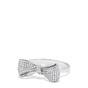 A dazzling Novelty 14K White Gold Diamond Bow Ring, 0.35 TCW, is beautifully showcased against a white background.