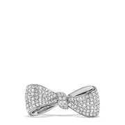 A dazzling Novelty 14K White Gold Diamond Bow Ring, 0.35 TCW, is beautifully showcased against a white background.