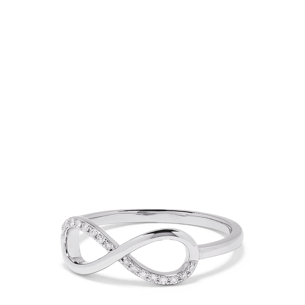 The Novelty 14K White Gold Diamond Infinity Ring, 0.06 TCW, features an elegant infinity symbol with sparkling diamonds and is displayed on a plain white background. An exquisite piece from the Effy Novelty collection.