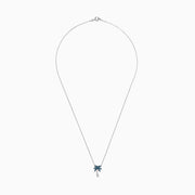 The Novelty 14K Gold Blue & White Diamond Palm Tree Necklace, 0.25 TCW, features sparkling gemstones on the leaves and trunk, beautifully displayed against a plain white background.