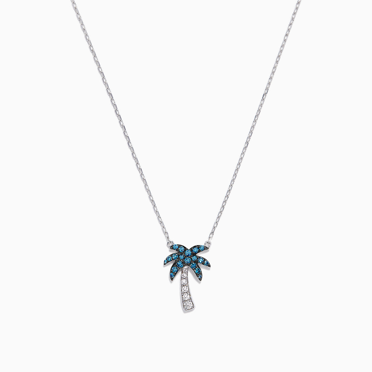 The Novelty 14K Gold Blue & White Diamond Palm Tree Necklace, 0.25 TCW, features sparkling gemstones on the leaves and trunk, beautifully displayed against a plain white background.