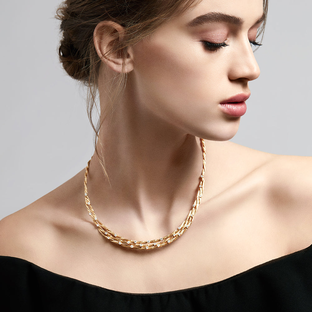 The DOro 14K Textured Yellow Gold Diamond Collar Necklace, 1.68 TCW, features twisted strands with evenly spaced round diamonds and is elegantly displayed on a white background.