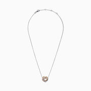 An elegant Trio 14K Tri Color Gold Diamond Heart Necklace, 0.40 TCW, features a thin chain with three interlocking hearts in silver, gold, and rose gold tones for a sparkling, timeless look.