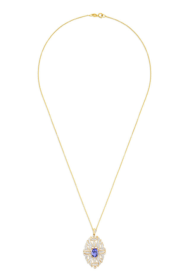 The 14K Yellow Gold Tanzanite and Diamond Pendant, 1.57 TCW, features an ornate oval design with a central tanzanite gemstone accented by diamonds, beautifully set in polished 14K yellow gold.