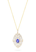 The 14K Yellow Gold Tanzanite and Diamond Pendant, 1.57 TCW, features an ornate oval design with a central tanzanite gemstone accented by diamonds, beautifully set in polished 14K yellow gold.