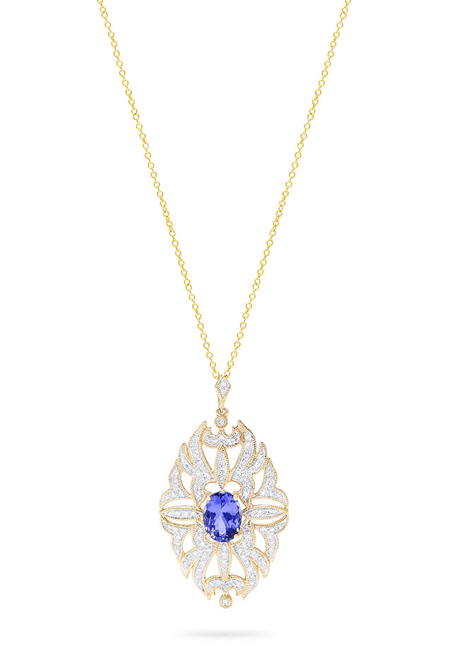 The 14K Yellow Gold Tanzanite and Diamond Pendant, 1.57 TCW, features an ornate oval design with a central tanzanite gemstone accented by diamonds, beautifully set in polished 14K yellow gold.