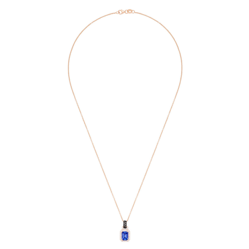 The 14K Rose Gold Emerald Cut Tanzanite and Diamond Pendant (1.56 TCW) features a rectangular tanzanite surrounded by sparkling diamonds on a delicate rose gold chain.