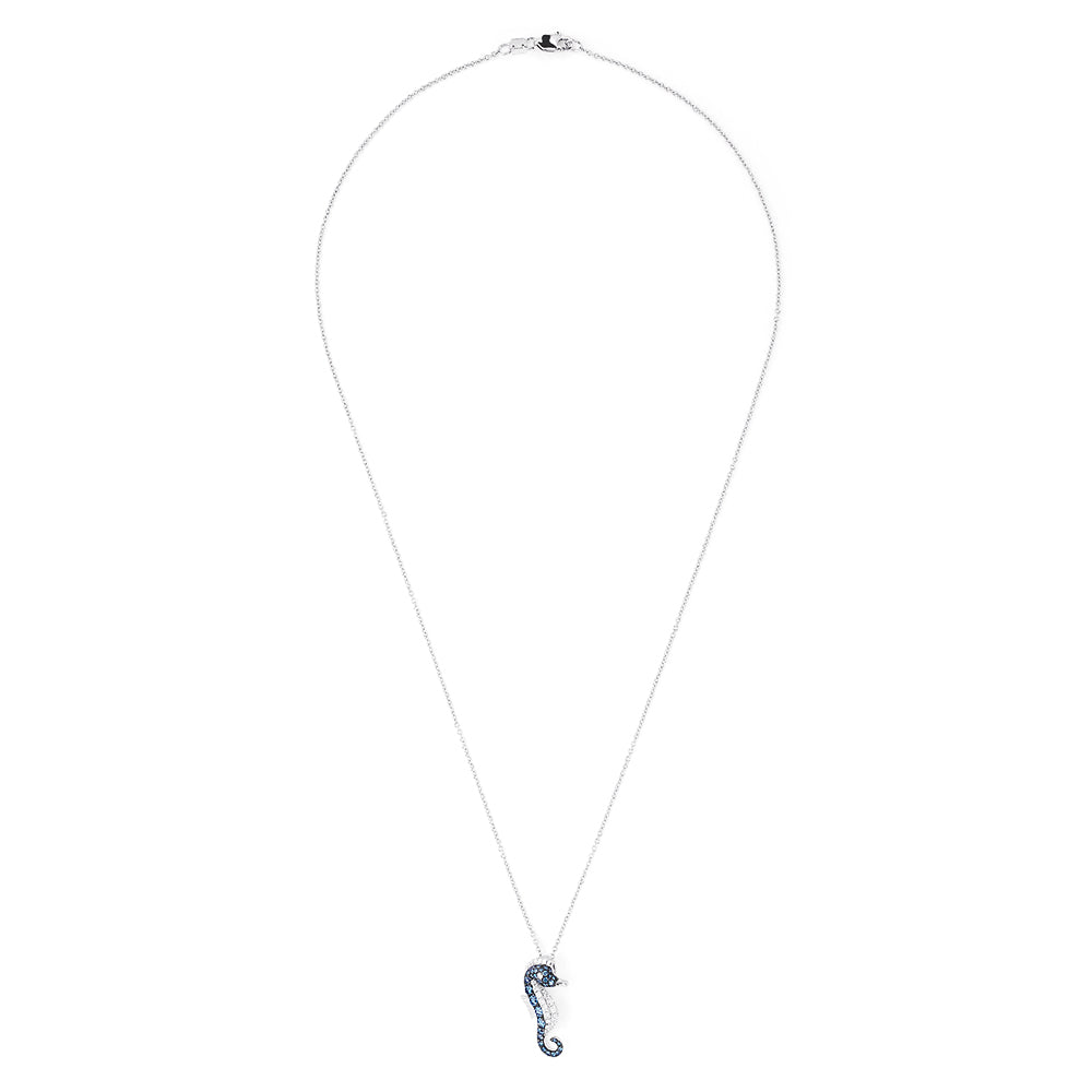 The Novelty 14K Gold Blue & White Diamond Seahorse Pendant, 0.62 TCW, features sparkling diamonds on its body and hangs elegantly from a delicate chain against a white background.