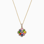 The Watercolors 14K Yellow Gold Multi Sapphire & Diamond Pendant (1.85 TCW) features a vibrant flower-shaped design with colorful sapphires and sparkling diamonds, hanging from a delicate gold chain on a white background.