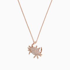 The Seaside 14K Yellow Gold Pave Diamond Crab Pendant (0.21 TCW) features a crab with sparkling diamonds and detailed legs, hanging from a fine gold chain, shown on a white background.