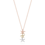 The Seaside 14K Tri Color Gold Diamond Starfish Trio Pendant features three starfish in rose, yellow, and white gold, set with 0.23 TCW diamonds.