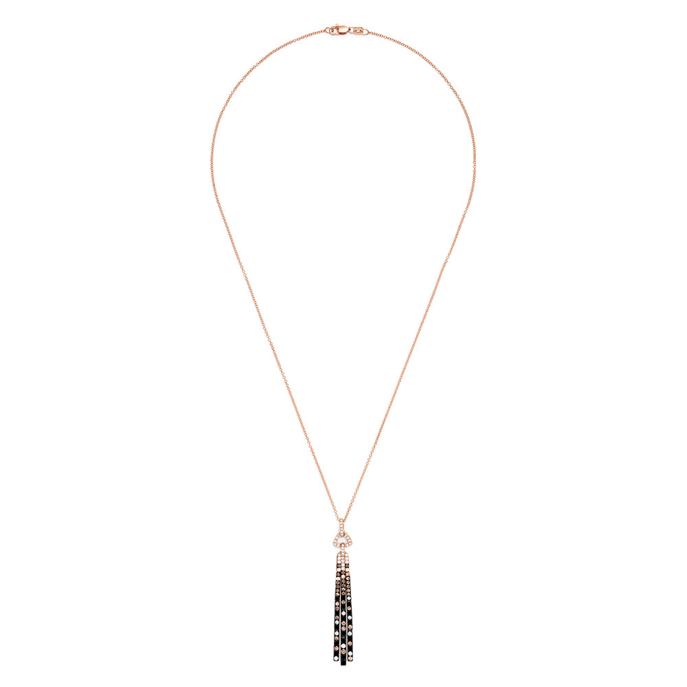 The Confetti 14K Gold Pendant features black, espresso, and white diamonds (1.17 TCW) on a long rose gold chain with a gold pendant accented by geometric details and three black tassels adorned with clear gemstones.
