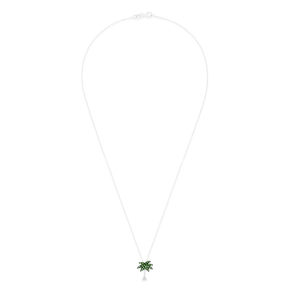 The Novelty 14K White Gold Tsavorite & Diamond Palm Tree Pendant (0.29 TCW) features tsavorites on the leaves and sparkling diamonds on the trunk, elegantly displayed against a white background.