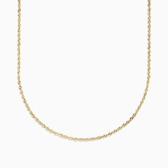 The 14K Yellow Gold 20 Woven Chain is displayed on a plain white background, featuring a gentle curve that accentuates its elegant twisted design.