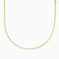 The 14K Yellow Gold 20 2.5mm Paperclip Necklace showcases elegant elongated oval links, beautifully set against a plain white background.