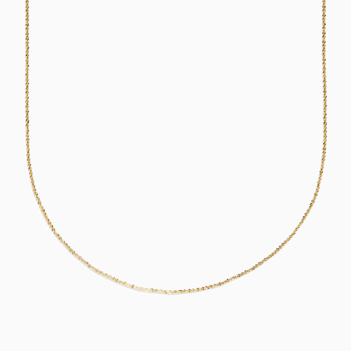 The 14K Yellow Gold Twisted Rope Chain is displayed against a plain white background, gently curving at the center.