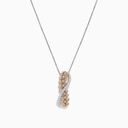The 14K two-tone gold crossover pendant features a twisting ribbon design with brown and white diamond accents totaling 1.00 TCW, hanging from a delicate chain.