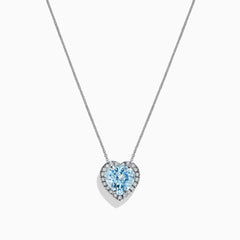 A 14K white gold pendant featuring a heart-shaped aquamarine surrounded by diamonds (2.90 TCW), displayed against a white background.