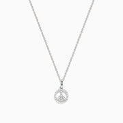The 925 Sterling Silver Diamond Peace Sign Necklace features a delicate chain with a small, round pendant encrusted with clear, sparkling gemstones in the shape of a peace sign.