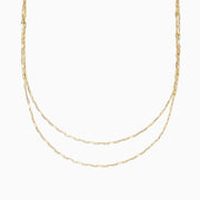 The 14K Yellow Gold 16 Mirror Chain Necklace features two layers of delicate, elongated links in a mirror chain design, showcased against a plain white background.