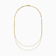 The 14K Yellow Gold 16 Mirror Chain Necklace features two layers of delicate, elongated links in a mirror chain design, showcased against a plain white background.