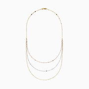 The 14K Tri Tone Gold Mirror Chain Necklace 17 features delicate oval and round links in rose gold, silver, and yellow gold tones, beautifully displayed against a white background.