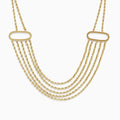 The 14K Yellow Gold Layered Rope Necklace features five twisted chain strands, each joined by two oval-shaped gold links on either side.