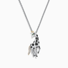 The Safari Sterling Silver Black Diamond Giraffe Pendant (0.13 TCW) features black spots, a green eye, and a gold-accented tail—part of the Effy Safari collection.
