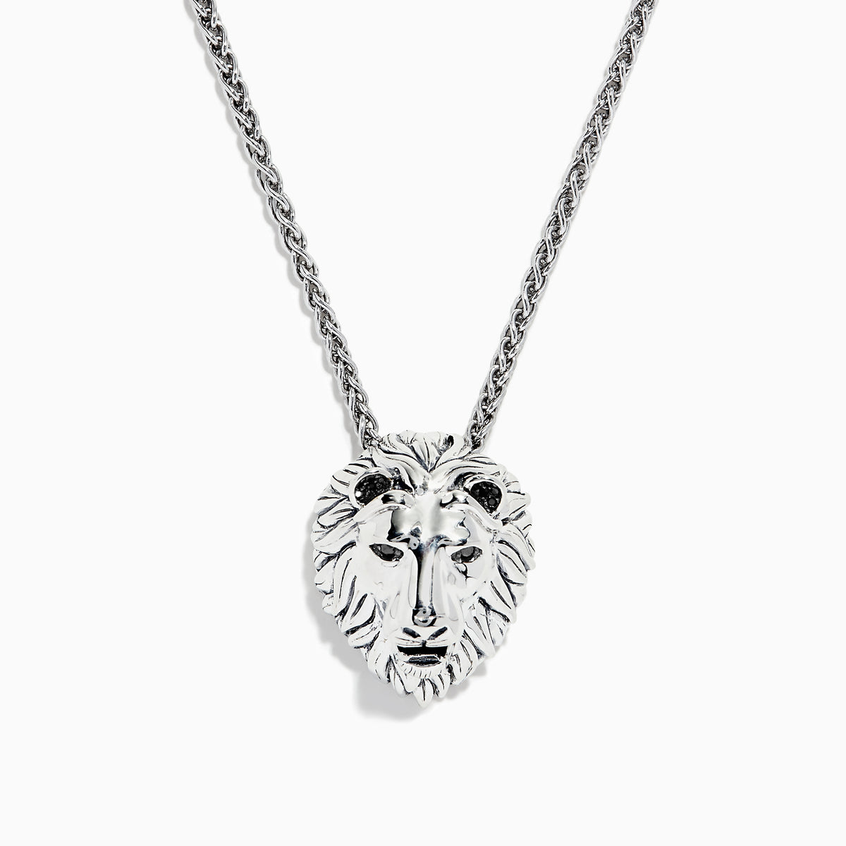 The 925 Sterling Silver Black Diamond Lion Pendant (0.07 TCW) showcases a lions head with detailed features and black diamond eyes, suspended from a twisted chain.
