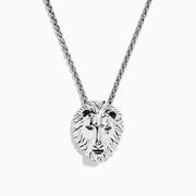 The 925 Sterling Silver Black Diamond Lion Pendant (0.07 TCW) showcases a lions head with detailed features and black diamond eyes, suspended from a twisted chain.