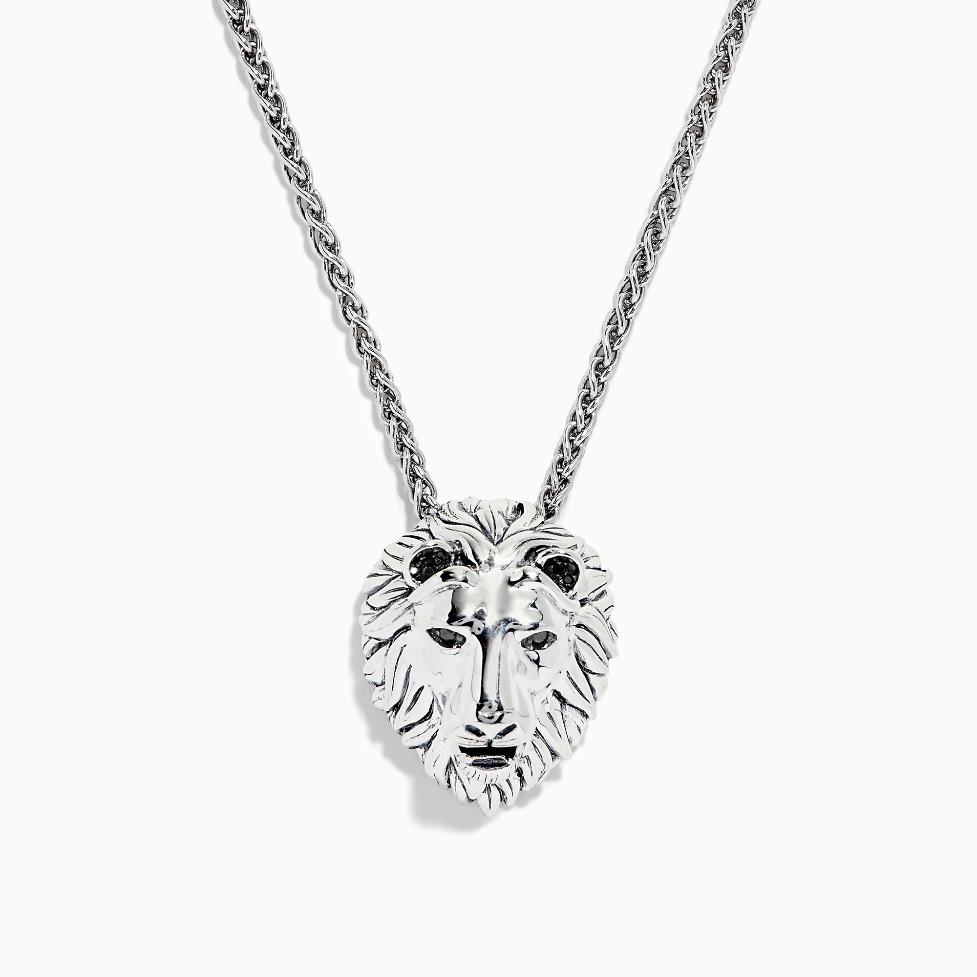 The 925 Sterling Silver Black Diamond Lion Pendant (0.07 TCW) showcases a lions head with detailed features and black diamond eyes, suspended from a twisted chain.