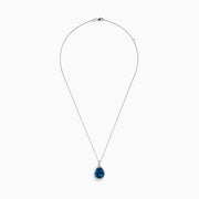 The Ocean Bleu 14K Gold London Blue Topaz and Diamond Pendant, 9.45 TCW, features a teardrop-shaped blue topaz surrounded by sparkling diamonds, shown on a plain white background.