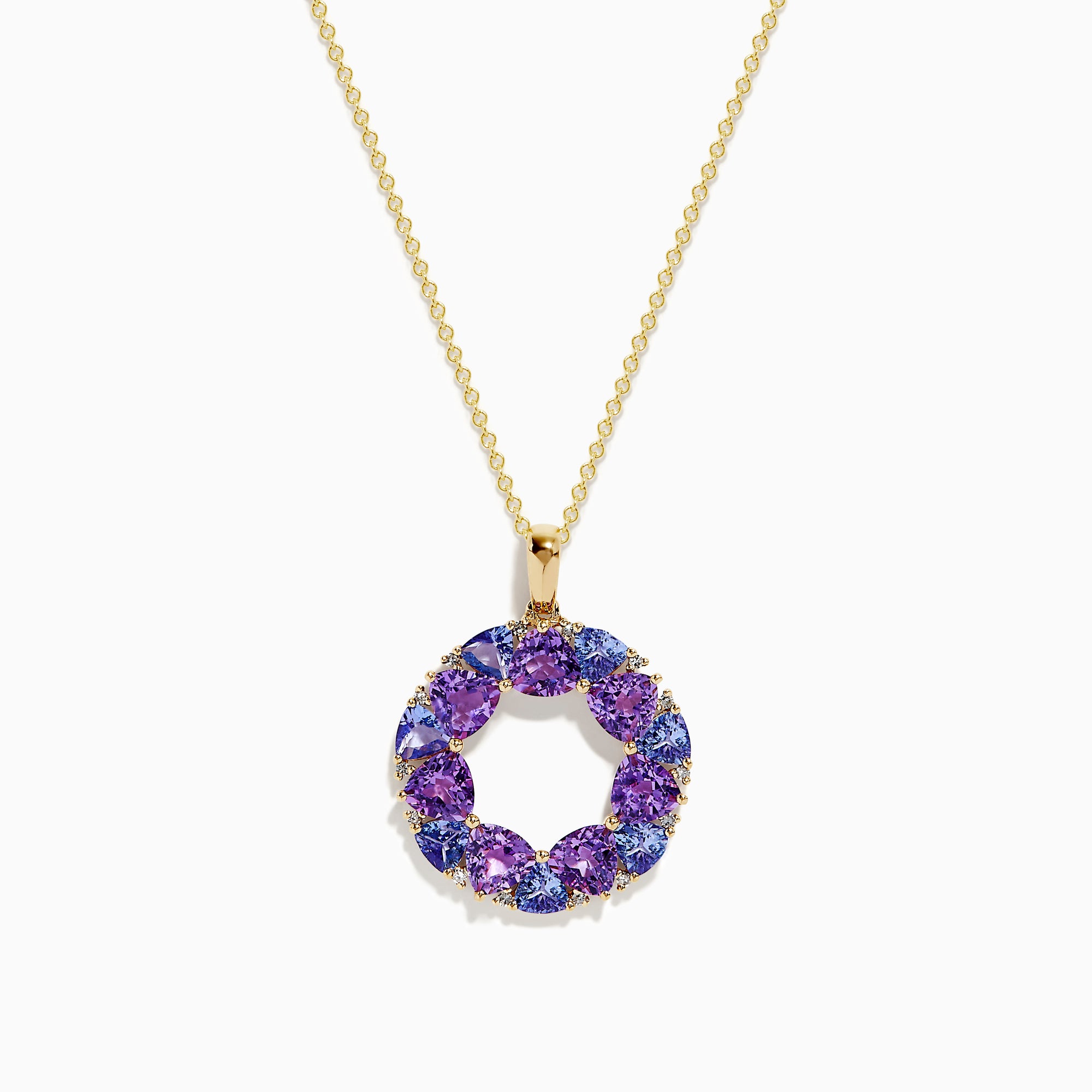 The 14K Yellow Gold Amethyst, Tanzanite, and Diamond Pendant features alternating colorful gemstones in a circular design, hanging elegantly from a delicate gold chain.
