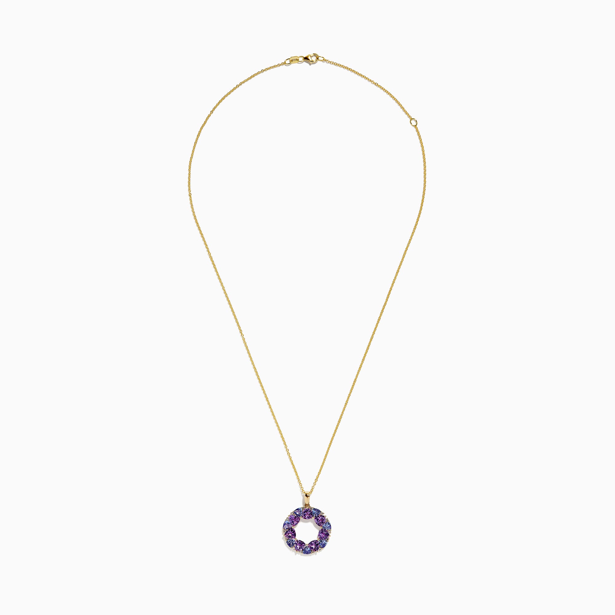 A 14K yellow gold necklace with a thin chain and a circular pendant featuring amethyst, tanzanite, and diamond gemstones, displayed on a white background.