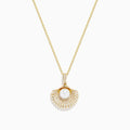 The 14K Yellow Gold Pearl and Diamond Shell Necklace features a pendant shaped like a fan with a central white pearl, surrounded by sparkling diamonds for timeless elegance.