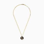 The Novelty 14K Yellow Gold Onyx and Diamond Dragon Coin Pendant (4.62 TCW) features an oval onyx with a gold dragon design, framed by a twisted rope border and accented on an elongated link chain with small gold beads.