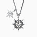 Mens Sterling Silver Ships Wheel and Star Pendant features two pendants—a star and a ship’s wheel with rope detailing and a central star design—hanging from a textured chain.