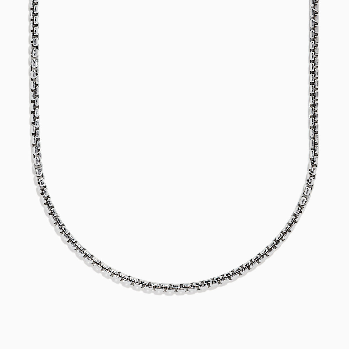 A close-up of the Mens Sterling Silver 21 Box Link Chain shows its sleek box chain design, displayed on a white background and curving gently at the bottom.