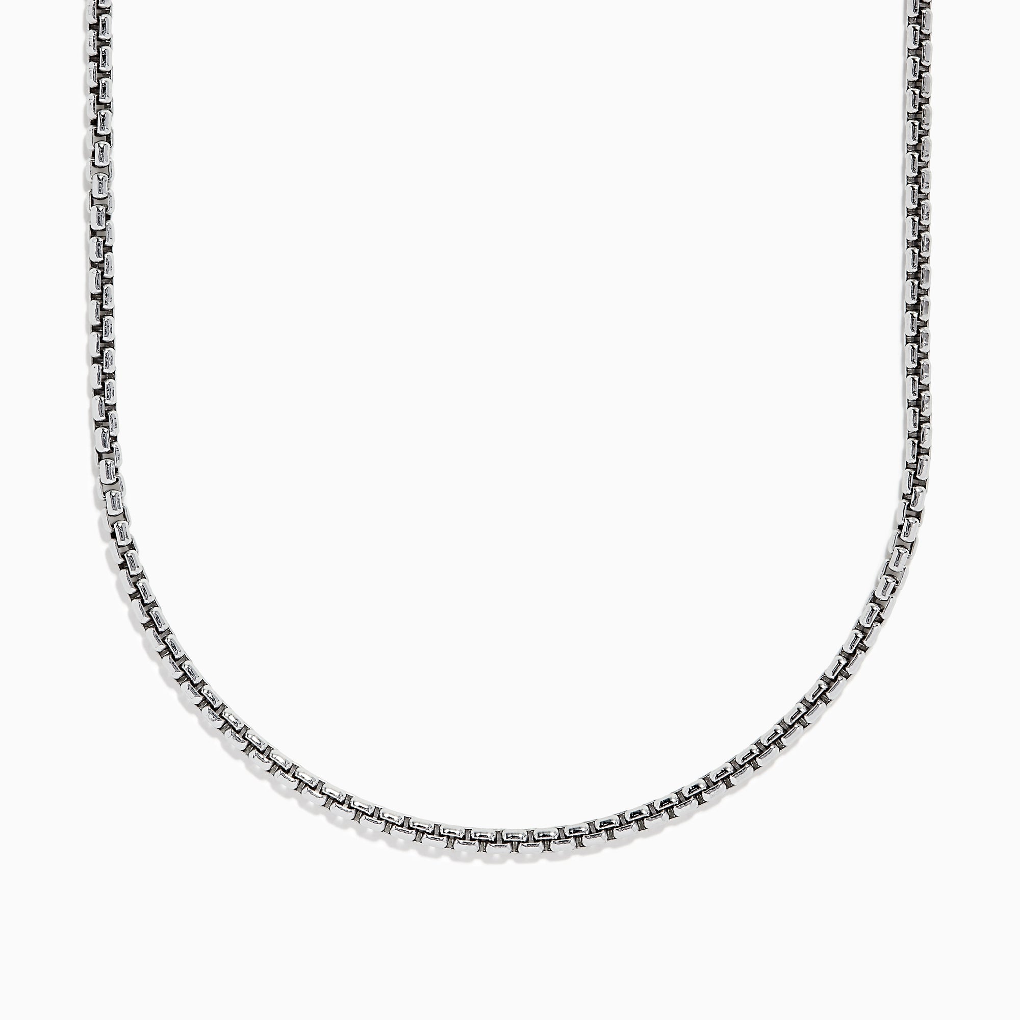 A close-up of the Mens Sterling Silver 21 Box Link Chain shows its sleek box chain design, displayed on a white background and curving gently at the bottom.