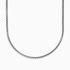 A close-up of the Mens Sterling Silver 21 Box Link Chain shows its sleek box chain design, displayed on a white background and curving gently at the bottom.