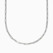 The 925 Sterling Silver Paperclip Chain Necklace, featuring elongated rectangular links, is elegantly displayed in a gentle curve against a white background.
